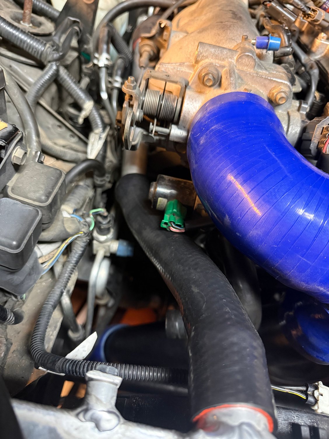 Redid the coolant reroute routing as I wasn�t happy with the hose making contact 3-4 different places and being slightly kinked. 