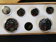 SpeedHut gauges are NICE!  Much nicer than I expected.  Machined aluminum bezels are a very nice touch, as is the custom logo.  LED's will be RED at night.