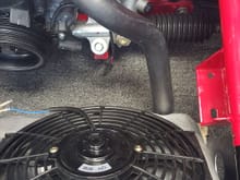 From the radiator into the water pump
