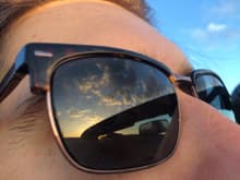 Artsy photo... Sunset at Coral Pink sand dune state park, and miata windshield reflected in my glasses :)