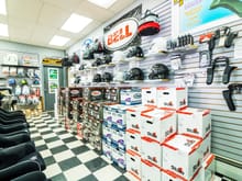 Stable Energies retail store. Helmet and Head/Neck restraint section. Here we do personalized helmet fittings for customers looking to purchase their first or upgrade helmet. We have  various sizes from HJC, Bell, Arai, and Stilo. Stable also offers radio communications helmet installs.