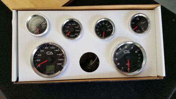 SpeedHut gauges are NICE!  Much nicer than I expected.  Machined aluminum bezels are a very nice touch, as is the custom logo.  LED's will be RED at night.