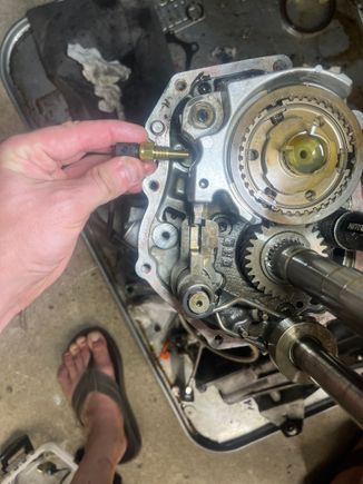 My 3D thinking says this is about the right place for the Ballenger sensor. It’s definitely in the fluid, yet should clear both the shift fork and whatever that other rod is. In theory. I will check this tomorrow after reassembly.