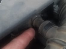 My 2008 G37s AT almost stalls sometimes at stops. I've heard that a bullydog programmer will solve the idle issue but i can't afford it just yet i found this piece loose coming off the drivers side air intake tube. Any idea what it is? Important to get it sealed up? I pulled it loose with the car running and it didn't seem to affect how it idled.