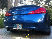 Blacked out emblems and Megan Racing Axle-Back Exhaust