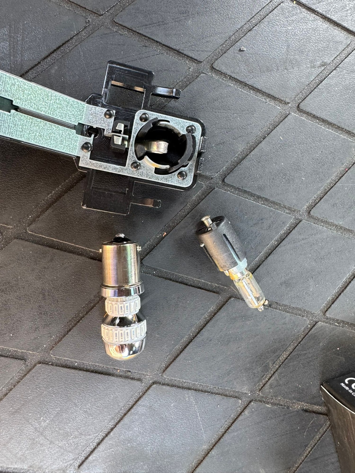 H21W bulb next to a plug-n-play 1156 LED bulb