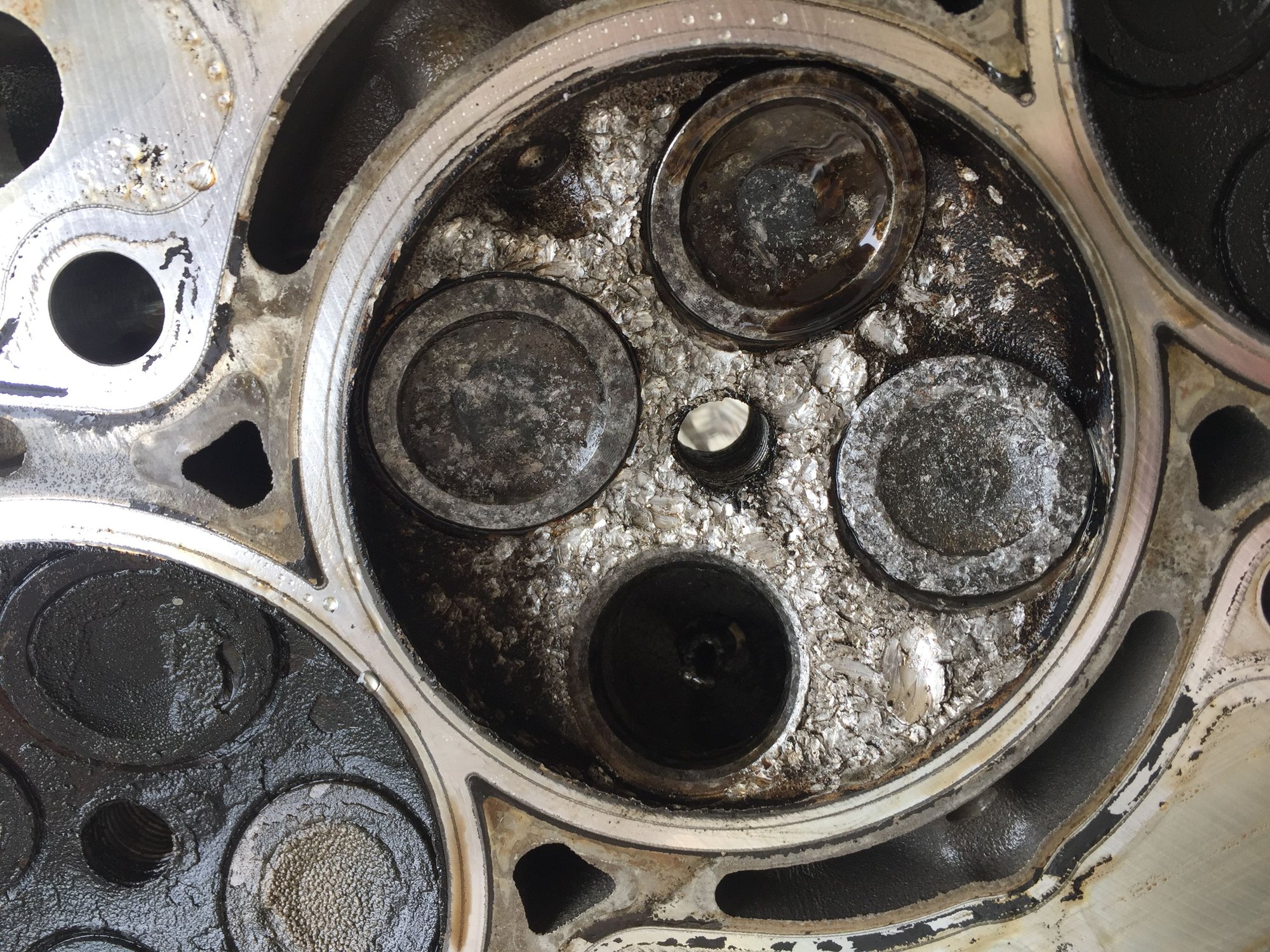 Melted spark plug end North American Motoring