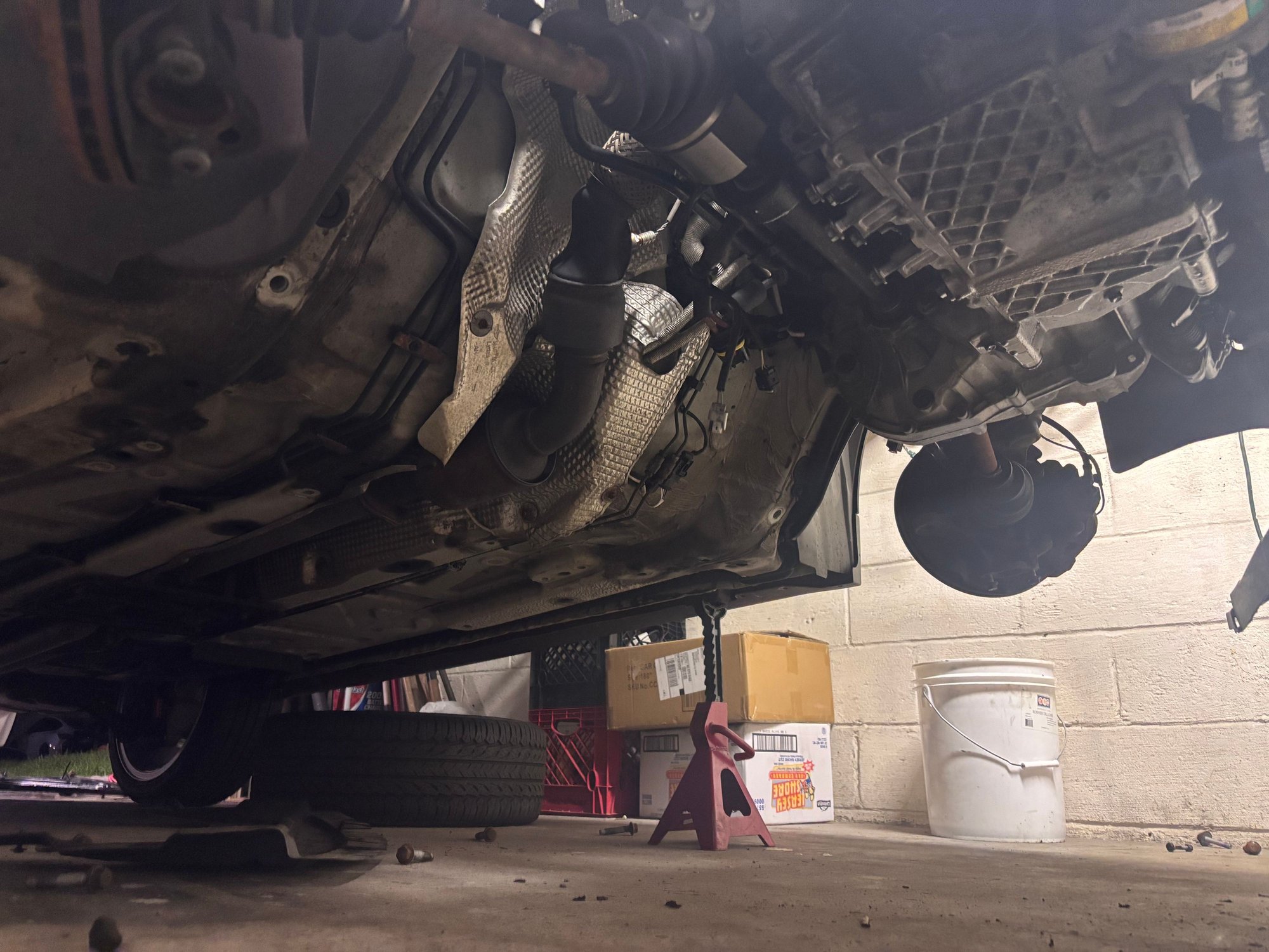 So much room underneath. I worked on the subframe then I cleaned up the undercarriage. This is when I drained the oil and replaced the oil pan gasket along with the oil filter housing gasket. 