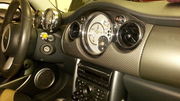 What is this center dash treatment called?  I like it but it's not on the glove box or other side.  Don't know if I can get those or a rap that matches?