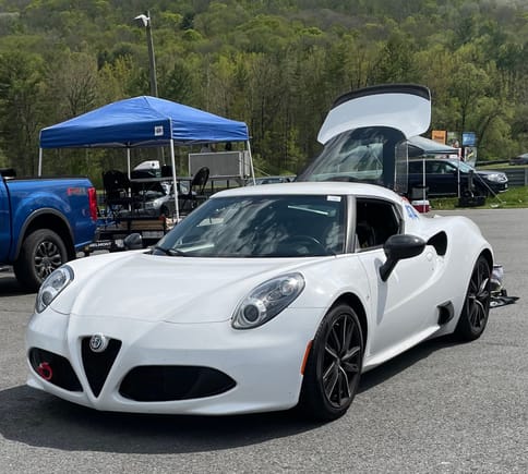 A mid-engine Alfa 4C (I think).  Yes, I looked in the back just to make sure it was a mid-engine :wink: