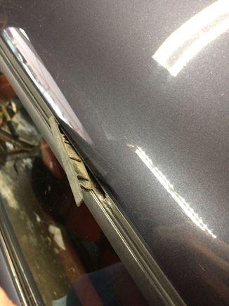 Cap partially fitted into the roof slot.