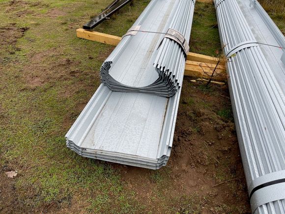 The standing seam roofing which will requires renting an electric seamer to finish the crimps.
