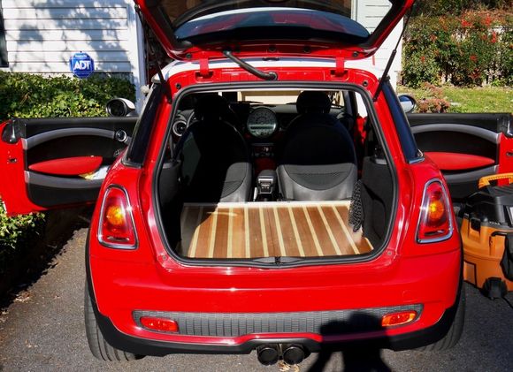 Maple and cheery flat floor in place of rear seats