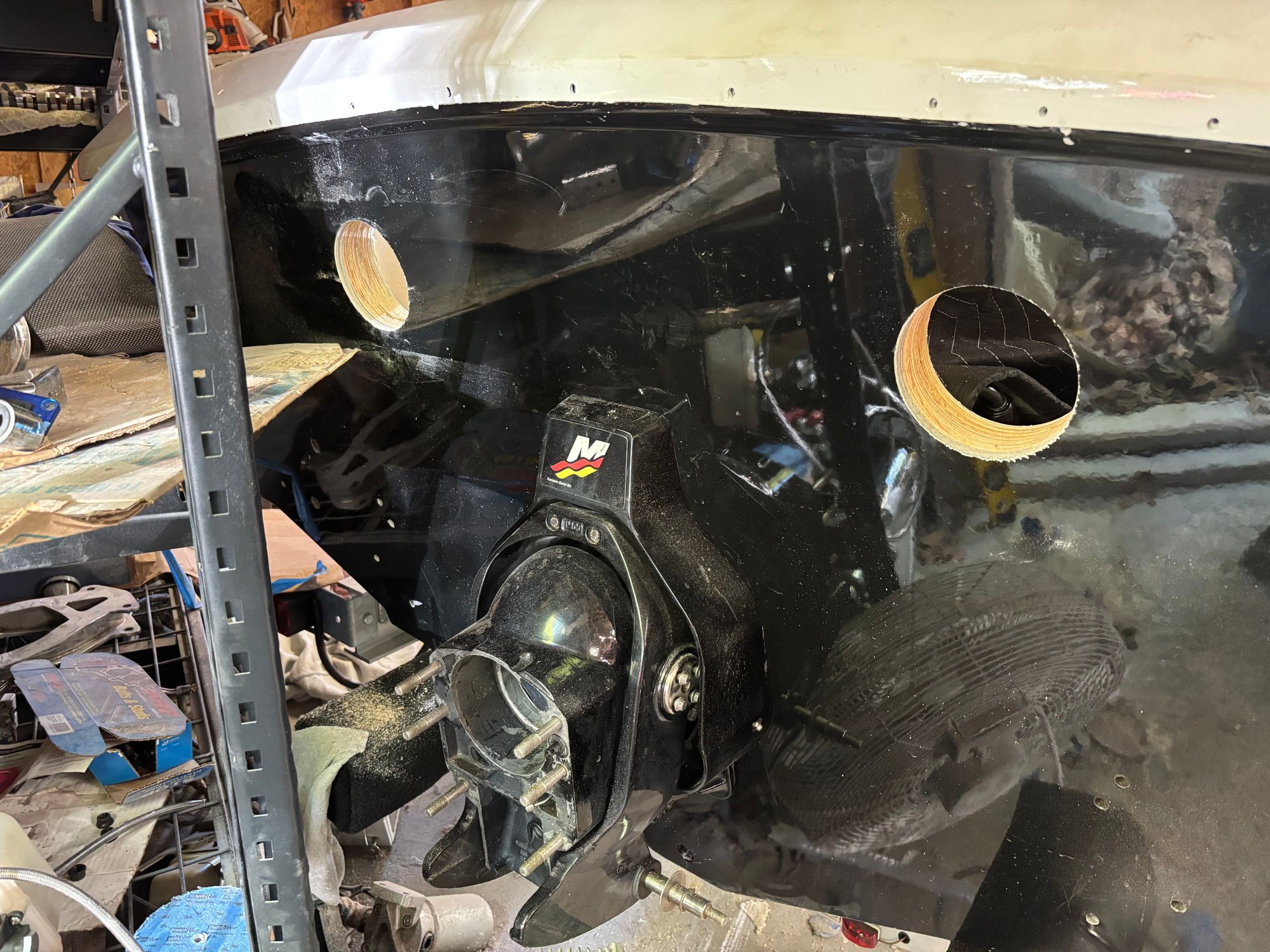 Cut the exhaust holes to factory merc bravo specs. Wish i went a hair higher but more angle wont hurt.