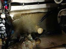 Bilge, with ice, oil dirt, and water