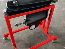 Had the stand custom made here. It is adjustable in width which I find convenient.