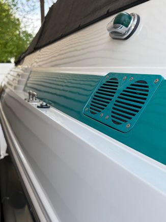 Starboard side 7’ forward of exit vent.  Must tie together in  behind upholstery.