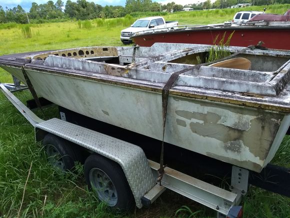 $900.00 with title as is. Needs stringers and restoration. Trailer can be bought. 