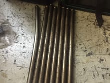 Left bank pushrods in no particular order.... Didnt pay attention pulling em out but i think the bent one was #7 intake all the right side pushrods were straight