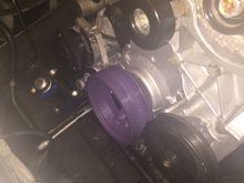 I cleaned up a little and painted my timing cover , water pump, tensioner and balancer..... Purple adds hp...... Lol itll match my shock boots and trans once my converter gets here friday:)