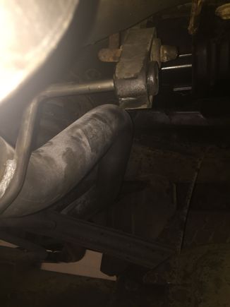 Need to heat this bracket up and bend it over a bit, oddly the flowmaster setup had an offset inlet and center outlet but factory was the opposite....