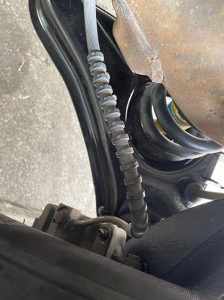 Passenger side brake line 