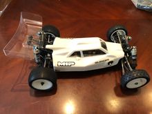 The car with white body.