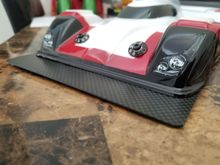 Close up of the splitter. It extends 30mm out front to increase downforce at the front. Obviously not race legal but it looks cool and functions. 1mm Carbon