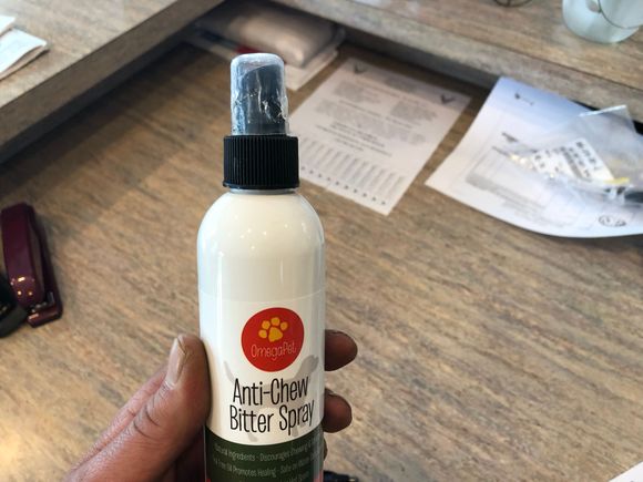 My managers have a new puppy. Anti chew spray that you can see the puppy has been chewing on the cap. 