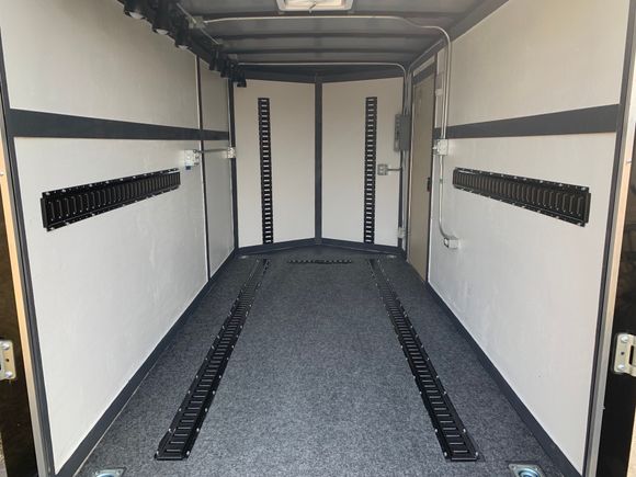 I decided to put some vertical E-Tracks up in the front to secure the portable A/C - Heater in transit. 