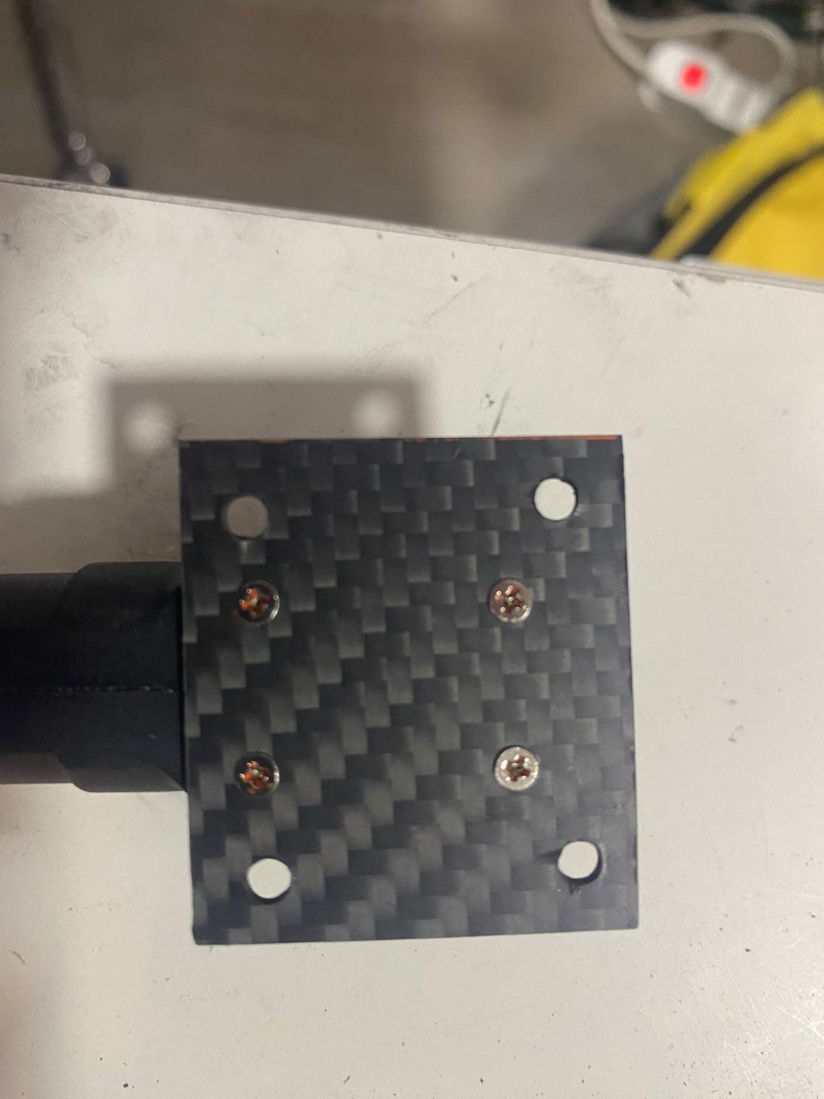 Carbon fiber made mounting plate