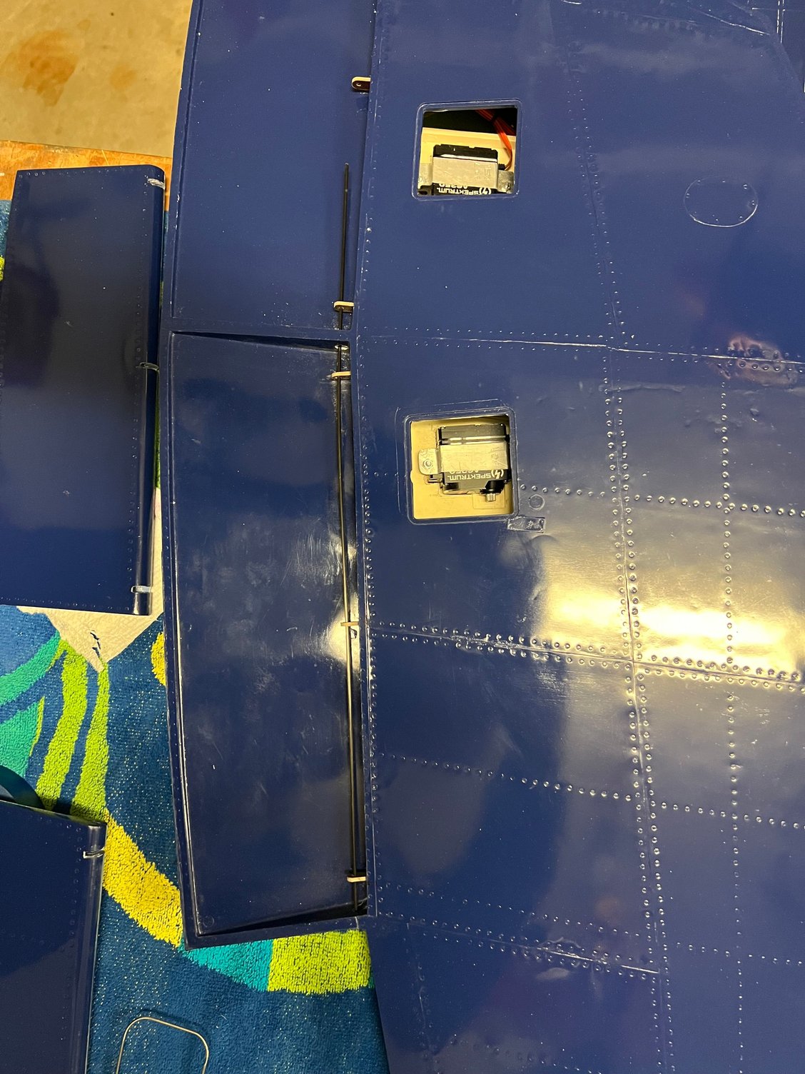 Flap rod arcing into place