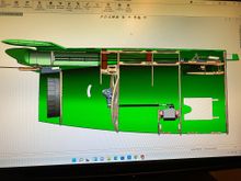 This shows the cylindrical volume available for the chute, along with the ram, and 6 springs. Carbon rods run fwd (around the vertical fin tube spars), running to above the speedbrake area, where some sort of deploy actuation would be.