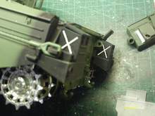 Embossed X's - both sides of rear Bins