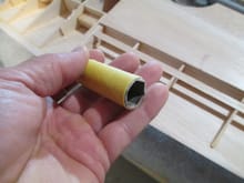 I wrapped sandpaper around a deep socket to sand to the pencil line.
