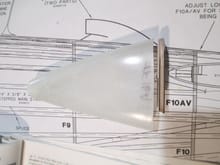 By beveling the edge,  the former inserted into the fiberglass tail cone  will make 100% contact. 