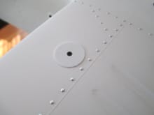 Needed to have the top of the  #0 x 3/16 flat head tapered sheet metal screws flush with the top of the hatch panel.