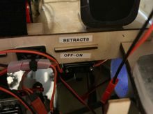 So it turns out the retract controller does not shut off when RX powered off. I decided to mount 2 switches under the front tray. Above is the switch on the left side which is plugged into a 2S lipo and then into both the retract and brake controller. The other switch plugged into 3S lipo and does lights