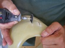 Here, I am cutting-out the valve cover clearance hole.