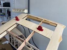 Used two pieces of 3/8 hardwood set flush to bottom of wing