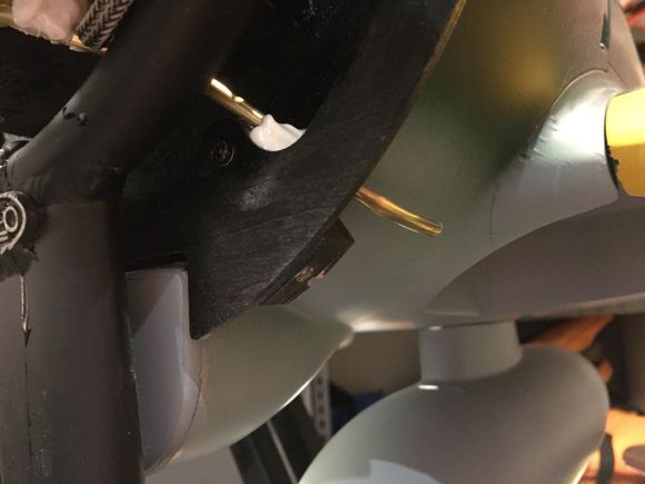 Brass tube used to feed the overflow between the area of the exhaust and engine