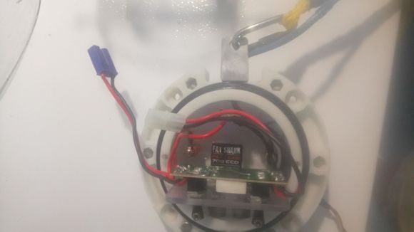 camera mounted inside the front assembly. note the umbilical tether connector.