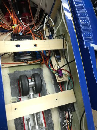 The tubs are screwed onto the plywood plates that hold them in place in the fuse.