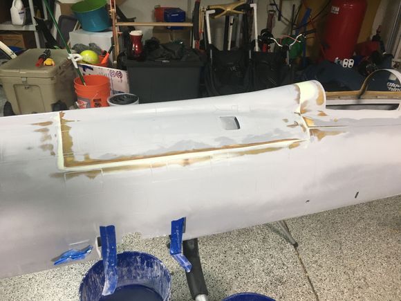 Here is the hatch once it was done before primer. Of note the back of the canopy was about 1/16” lower than hatch so I faired it in. You can see how much it took and how far I extended to make it look right