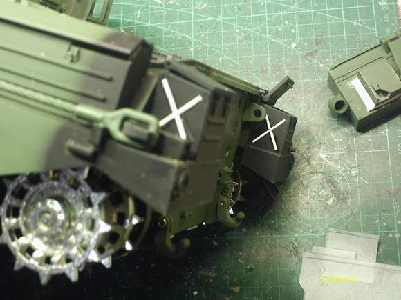 Embossed X's - both sides of rear Bins