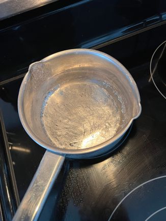 This is the Cerobend metal that HAS to be poured into the tubes prior to bend.  Very low melt temp.