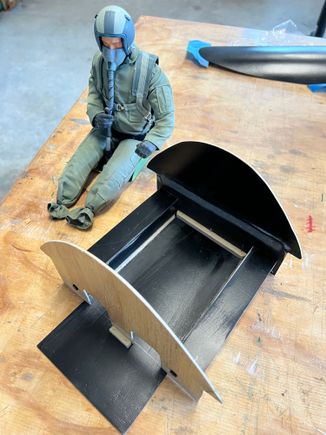 Front and back formers are bonded into the canopy hatch.  Seat floor with its attached side panels are removable with 4 screws.  Floor is also held in with tiny flush screw fore and aft.