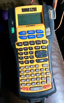 DYMO Rhino 5200 labeler. Does heatshrink tubing and vinyl labels.