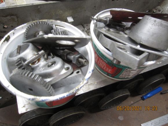 The left and right final drives, cleaned waited for reassembly