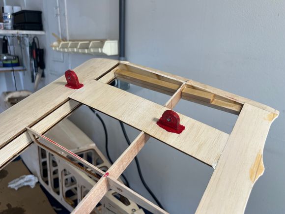 Used two pieces of 3/8 hardwood set flush to bottom of wing